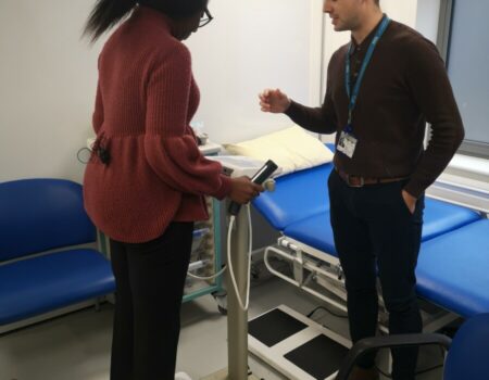 Patient on weighing scales