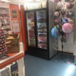 charity shop drinks fridge and balloons