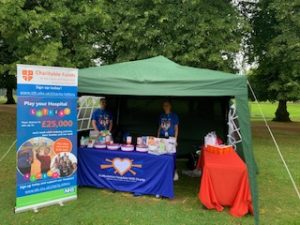 Members of the Charity team under marquee