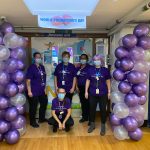 staff outside NICU during purple party