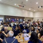 Attendees at table for spring quiz