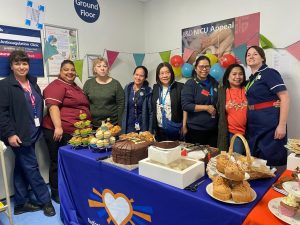 Critical Care team holding a bake sale