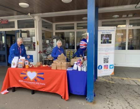 Volunteers with the charity stand