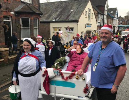 Volunteers dressed in nurse uniform fundraising