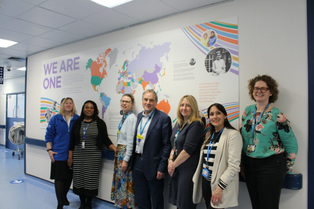 Staff at the We Are One display