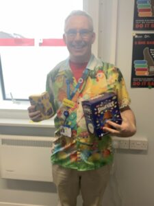 David Allen holding Easter eggs