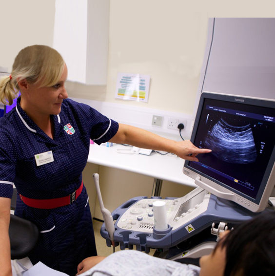 Nurse scanning a patient in the fertility clinic