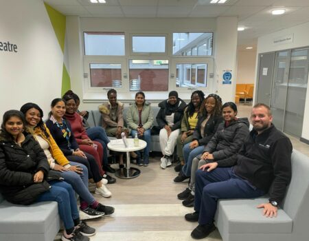 Group photo of preceptees sitting on sofa