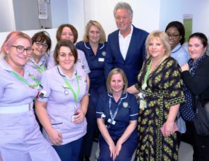 Paul Young with staff