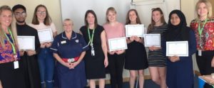 students receiving certificates