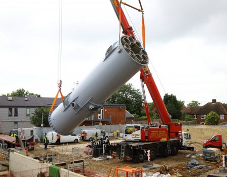 Chimney flue being lifted to position