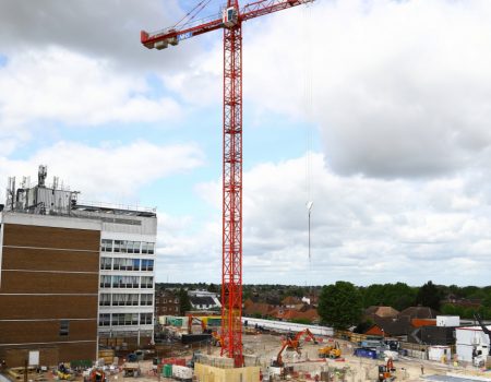 Photo of redevelopment site with a crane in the background