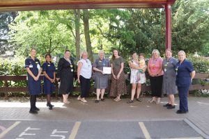 Photo of staff and Maternity Compliments Book