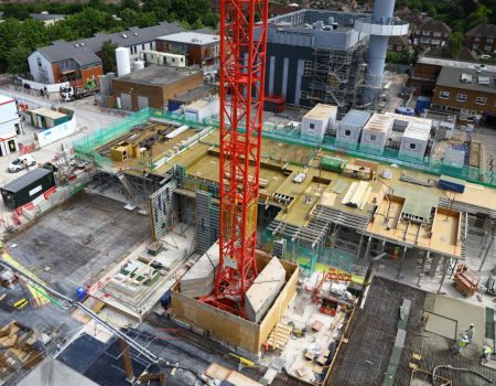 Photo of redevelopment site with crane in the centre