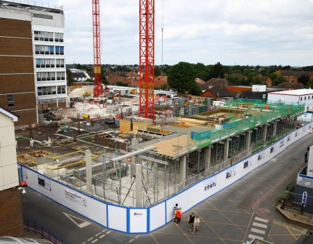 Photo of redevelopment site with a crane in the background of the image