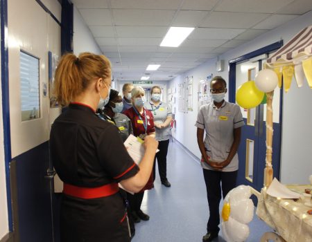 Chief Nurse Liz Lees speaking to staff about Salome's achievement