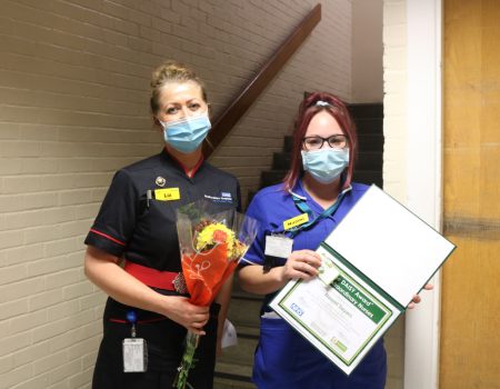 Chief Nurse Liz Lees with Naomi Sayers holding her certificate