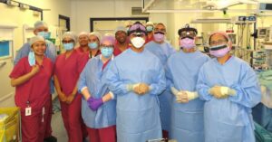 The L&D maxillofacial theatre team in their masks and operating uniforms