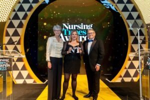 Jenny receiving the Nursing Times award