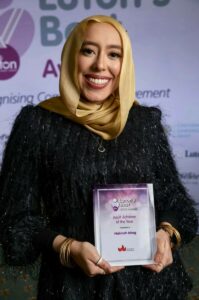 Halimah with the Adult Achiever of the Year winner certificate