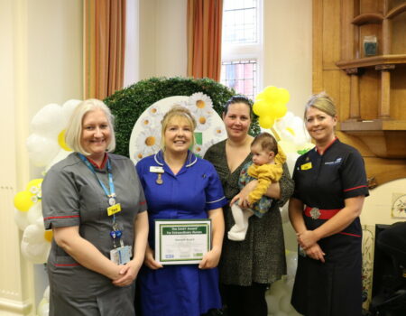 Tara and Liz with Hannah, and Hannah's nominator with her baby