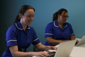Nurses working on computers for the virtual wards