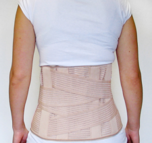 A person wearing a spinal corset