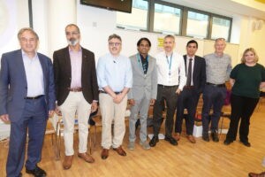 Richard and the speakers at the medical lecture
