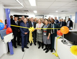 Attendees cutting the ribbon for the upgraded and refurbished Emergency Department