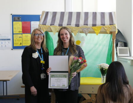 Bobbie and Liz with the award