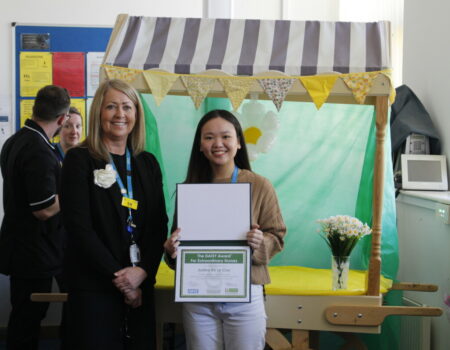 Justine and Liz with the award