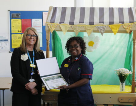 Pauline with Liz and her award