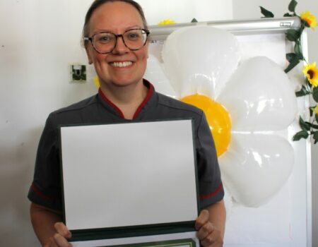 Louise Molson with certificate